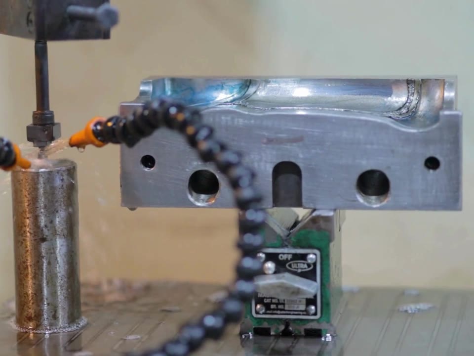 Injection mould cavity insert being machined by EDM in the GPI tool room, Delhi